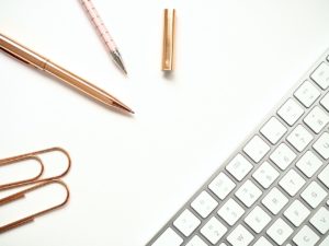 keyboard, pens, paper clips